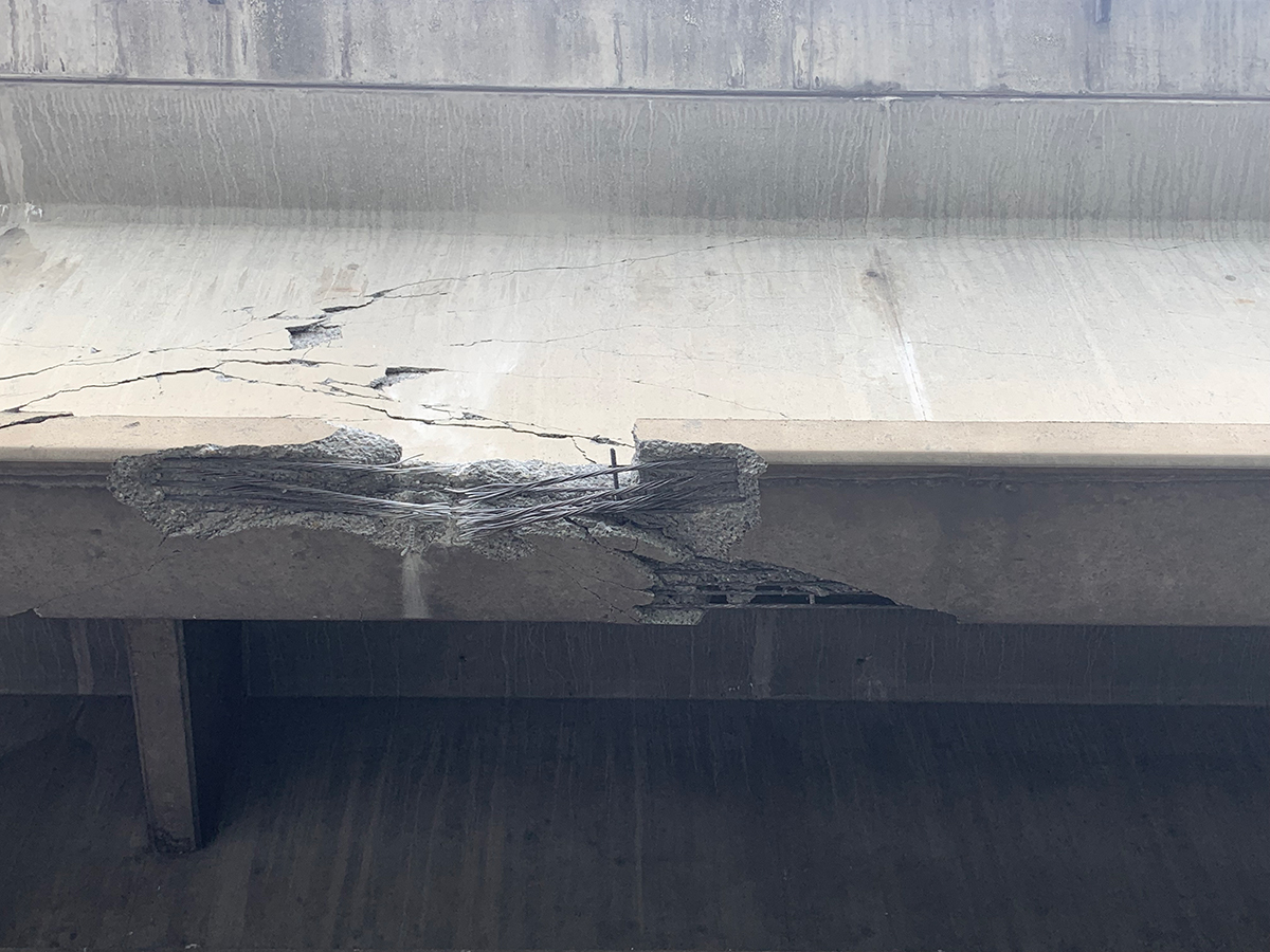 Close-up of bridge strike damage