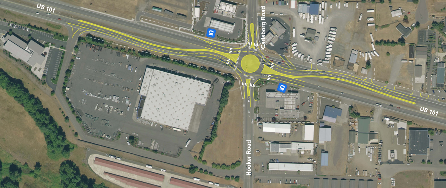 An aerial map image of the US 101 and Carlsborg Road intersection with a two-lane roundabout graphic drawn on top.