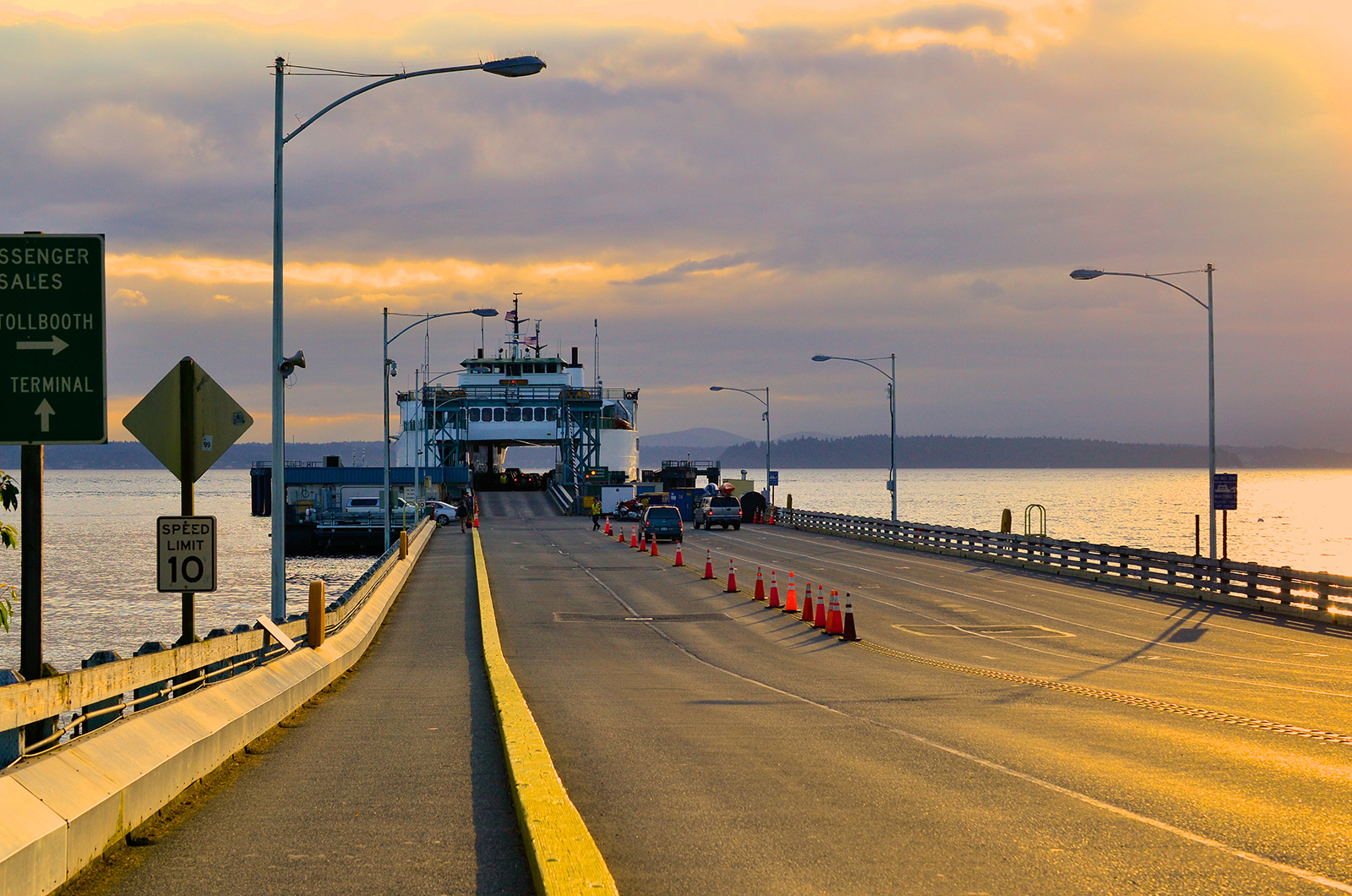 Photo of a an Issaquah class ferry at Fauntleroy ferry terminal at sunset