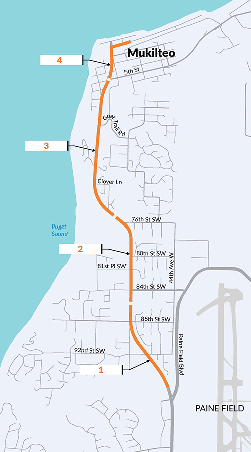 An orange line showing the project area for both projects on SR 525. The line is divided into four segments, starting with Segment 1 being located from Paine Field Blvd (SR 525 Spur) to 88th Street Southwest. Segment 2 is from 88th Street Southwest to 76th Street Southwest. Segment 3 is from 76th Street Southwest to 6th Street. Segment 4 is from 6th Street to the Mukilteo Ferry Terminal.